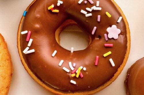 Baked vanilla donuts with chocolate frosting